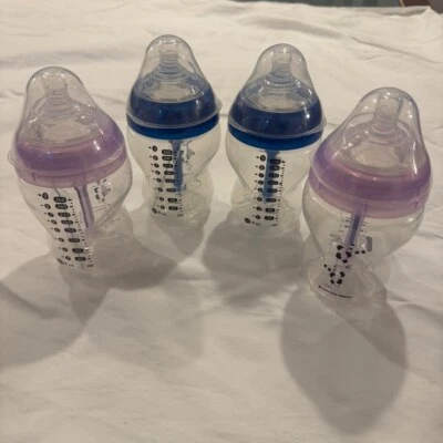 Lote de 4 biberones Tommee Tippee 9 oz azul y púrpura sin usar alimentación infantil Foto 1 de 4