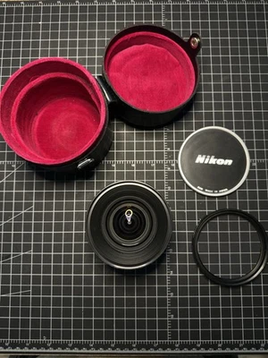 Nikon Nikkor AI 18mm F4 Lens with Caps Case And Filter. Estate find - Image 1 of 4