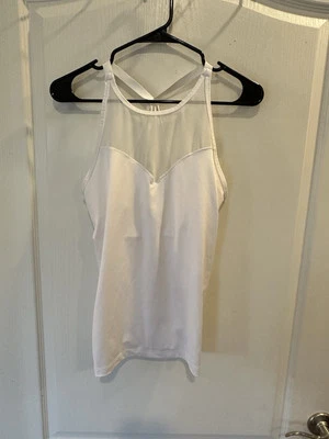 Camiseta sin mangas deportiva Victoria's Secret blanca con tiras de malla ropa deportiva mediana Foto 1 de 4
