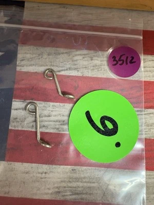 Nitro Muffler / Exhaust Hanger: PreOwned  / 2pc. / TRAXXAS / Universal - Image 1 of 4