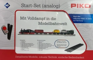 PIKO 57123 H0 DC BR 55, Start-Set Güterzug, DR mit Bettung - Picture 1 of 3