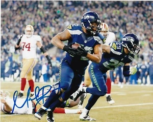 MICHAEL BENNETT SEATTLE SEAHAWKS ACTION SIGNED 8x10 - Picture 1 of 1