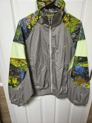 Chaqueta deportiva Adidas by Stella McCartney Earth Collage JG5793 para mujer talla pequeña Foto 1 de 4