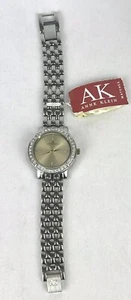 Reloj Anne Klein para mujer tono plateado bisel brillante 32 mm esfera dorada batería nueva nuevo en caja - Imagen 1 de 6
