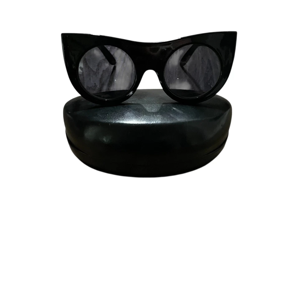 Gafas de sol rosa visón para mujer estilo ojo de gato monturas de diseñador estampado de leopardo negro Foto 1 de 3