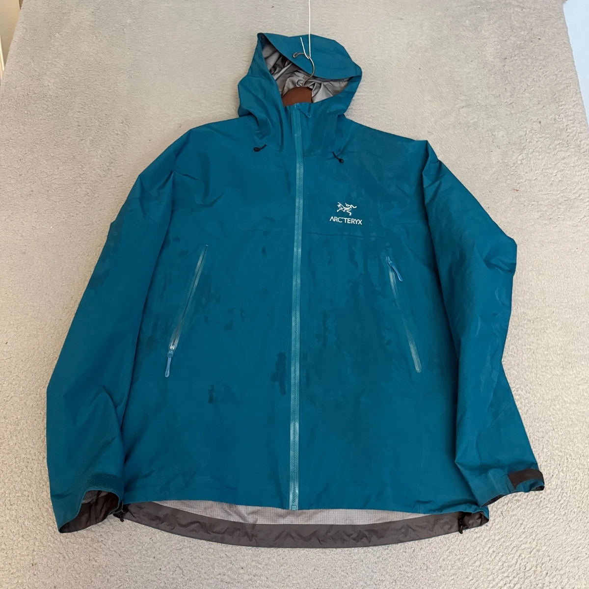 Preços baixos em Casacos de Chuva Arc'teryx Azul, Casacos