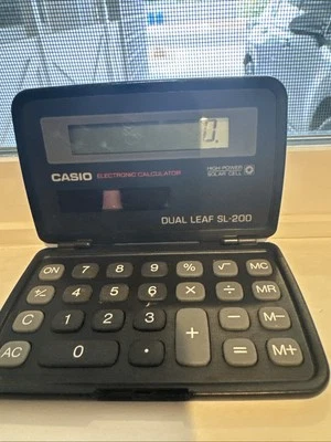 Casio SL-200 Flip Calculator Electronic Dual Leaf High Power Solar Cell - Image 1 of 3