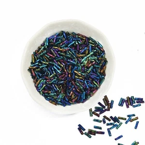 20 g kleine Glasperlen gedreht Bugle Iris Rainbow Bout 6 mm x 2 mm, Bohrung: 0,8 mm - Bild 1 von 1