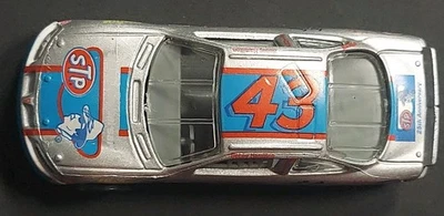 CAMPEONES DE CARRERAS 1995 BOBBY HAMILTON STP RICHARD PETTY CARRERAS 1/64 COCHE NASCAR 43 Foto 1 de 4