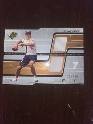 Doug Flutie 2001 Upper Deck SPx Winning Materials Double Jersey 215/750 Chargers - Image 1 of 3