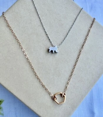 Collares - Collares en capas de oro rosa y plata - Elefante y joyería geométrica Foto 1 de 4