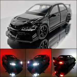 Modellino auto 1:32 - Mitsubishi Lancer Evo - con funzione luci e suoni - nero - Foto 1 di 24