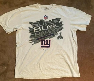 Camisa Reebok Campeones del Super Bowl 2012 de los Gigantes de Nueva York 2012 con licencia oficial - Imagen 1 de 3