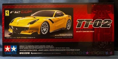 Tamiya Ferrari F12tdf scala 1/10 RC Car Kit TT-02 telaio nuovo mai usato - Immagine 1 di 4