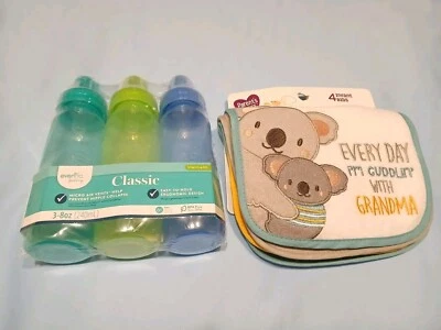 Mamadeiras e babadores - Imagem 1 de 4