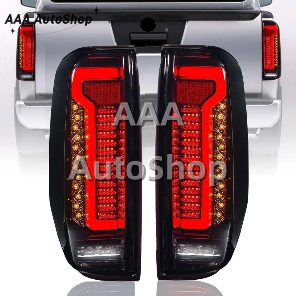 Se adapta a Nissan Navara D40 2005-2014 Frontier luces traseras de freno LED humo nuevas Foto 1 de 1