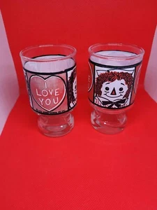 2 VINTAGE 1972 BOBBS MERRILL RAGGEDY ANN & ANDY "I LOVE YOU" SAFTGLAS 4" - Bild 1 von 4