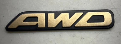 SUBARU OUTBACK AWD REAR HATCH EMBLEM OEM "AWD" TRUNK DECKLID LIFTGATE GATE GOLD - Image 1 of 2