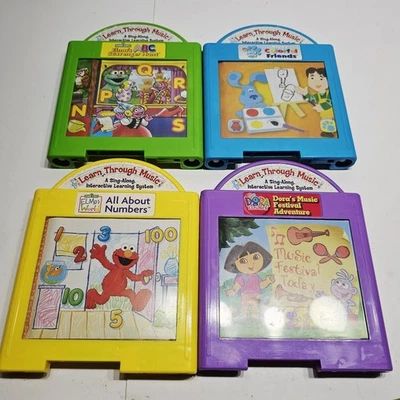 4 Cartridges Learn Thru Music Mattel Elmo Blues Clues Dora The Explorer - Image 1 of 4