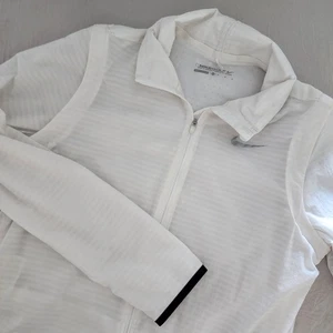 Chaqueta deportiva Nike Golf para mujer blanca ligera con cremallera completa talla M - Imagen 1 de 7