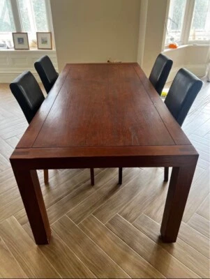 Dark solid wood dining table - Image 1 of 2
