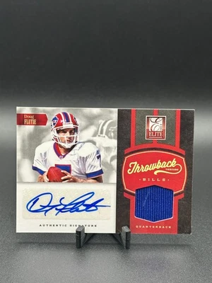 2012 Elite - Throwback Threads Doug Flutie #13 Autographs /15 (AU, MEM) - Image 1 of 2