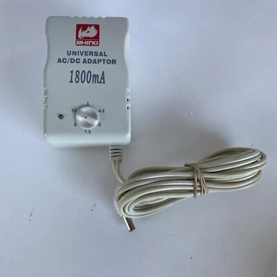 Adaptador de fuente de alimentación universal 3v-12v AC/DC 1800m reversible polar rinoceronte Foto 1 de 4