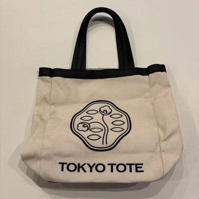 Bolso de Mano SHISEIDO Ginza Tokyo 8x8x3 en Bolso Pequeño de Lona Foto 1 de 4
