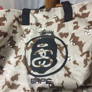 stussy camera bolsa