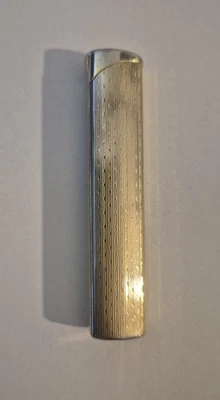 Encendedor Corona IM Japón tono dorado delgado Foto 1 de 4