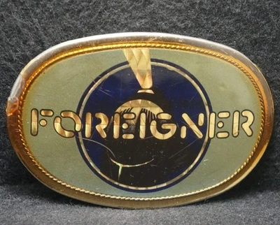XB19148 GREAT VINTAGE 1970s *FOREIGNER* ROCK BAND MUSIC MENS PEWTER BELT BUCKLE - Image 1 of 2