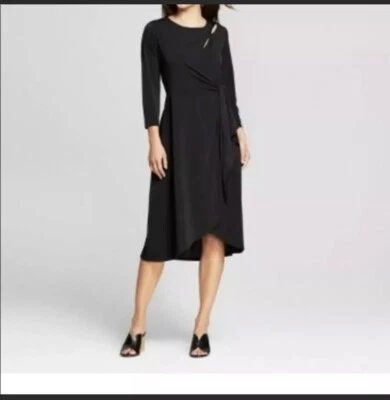 Vestido negro cintura torcida para mujer pequeñas notaciones recortes Foto 1 de 4