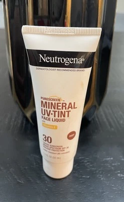 Protector solar tintado líquido facial con tinte UV mineral Neutrogena SPF30 (profundo) (1,1 oz) Foto 1 de 2