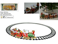 TRENINO NATALIZIO MUSICALE IN MOVIMENTO SUI BINARI LUCI E SUONI PER BASE ALBERO