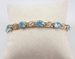 Brazalete de tenis vintage de oro amarillo de 14 quilates con topacio azul y diamantes cadena de seguridad - Imagen 1 de 7