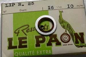 1 RESSORT DE BARILLET MONTRE LIP R25 bride a ailettes - Imagen 1 de 5