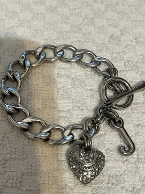 PULSERA 'JUICY COUTURE' TONO PLATA COLGANTE BRILLO CORAZÓN ENCANTO PALANCA Foto 1 de 3