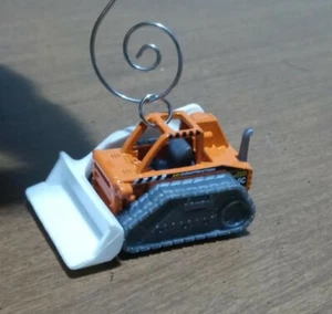 Streichholzschachtel orange Mini Dozer Kompaktlader Christbaumschmuck - Bild 1 von 2