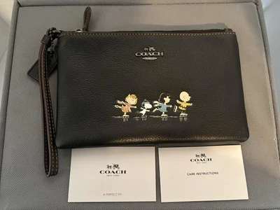 Muñequera de patinaje Coach Peanuts negra, viene con caja Foto 1 de 4