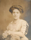 PORTRAIT SERENE WOMAN IN DAISY EMBROIDERED DRESS. TONED SILVER PRINT.  1900.   
