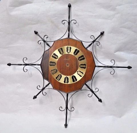 Vintage Wrought Iron & Walnut Starburst Wall Clock by Phinney Walker Cover
