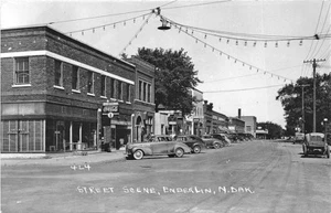 Enderlin ND Main Street Storefronts City News Stand Old Cars RPPC Postcard - Picture 1 of 2