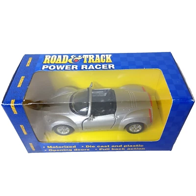 Road & Track Power Racer Plymouth Pronto Plateado NUEVA CAJA Maisto 1997 Pull Back Foto 1 de 4
