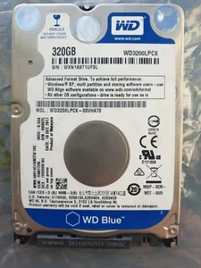 Western Digital 320GB WD3200LPCX-00VHAT0 2.5" SATA HARD DRIVE WD - DCM: HANT2HK - Picture 1 of 1