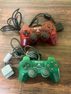 Lot of 2 Analog Controller Sony PlayStation Clear Red Green SCPH-10010 SCPH-1200 - Image 1 of 4