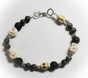 Lava Rock & Yooperlite Glow UV Stones With White Howlite Skulls Bracelet - Picture 1 of 2