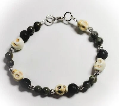 Lava Rock & Yooperlite Glow UV Stones With White Howlite Skulls Bracelet - Image 1 of 2