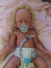 Bebe reborn de silicona platino