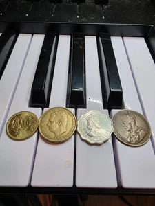 LOTE DE 4 monedas de todo el mundo lote de 4 monedas de todo el mundo - Imagen 1 de 2