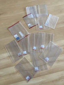 Schulbedarf-über 40 Teile-Buchschoner/Umschläge-Ordner-Heftumschläge z. Teil NEU - Bild 1 von 4